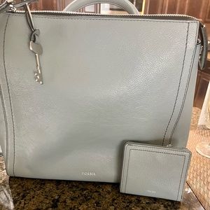 Only worn once. Adjustable small Backpack/Crossbody Strap, 1 Top Handle